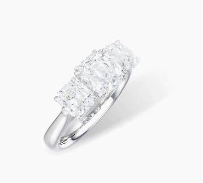 Three-stone round brilliant cut diamond ring